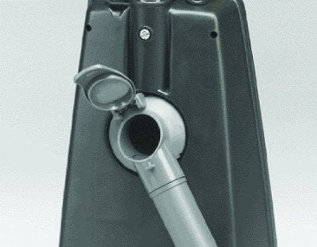 Hose connects to the backport of the vacuum cleaner which may look like this. Vacuum not included with the kit.